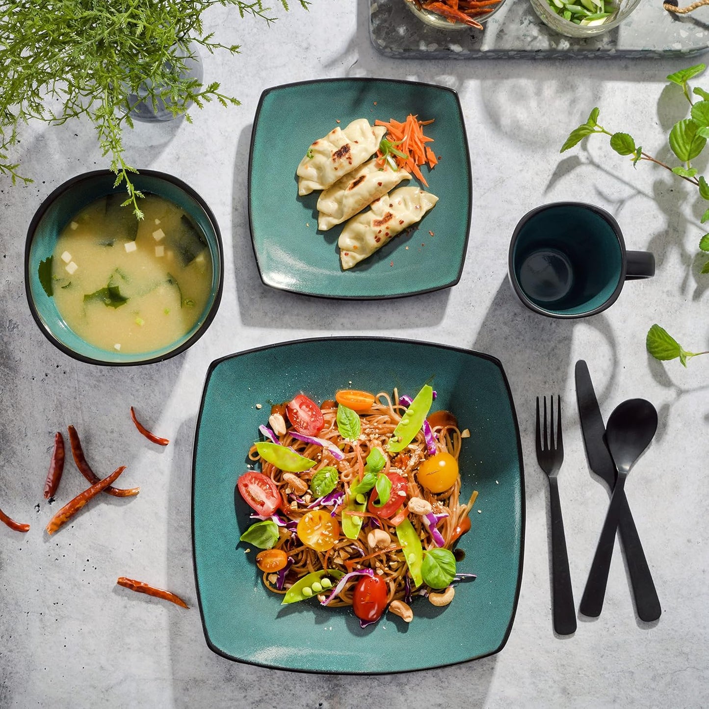 Gibson 99813.16R Elite Soho Lounge 16 Piece Reactive Glaze Dinnerware Set, Teal/Black Tutone